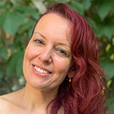 Headshot of St Paul Reiki practitioner Heather Robibaro